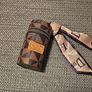 Vogue Geometric Brown and Black Cylinder Case